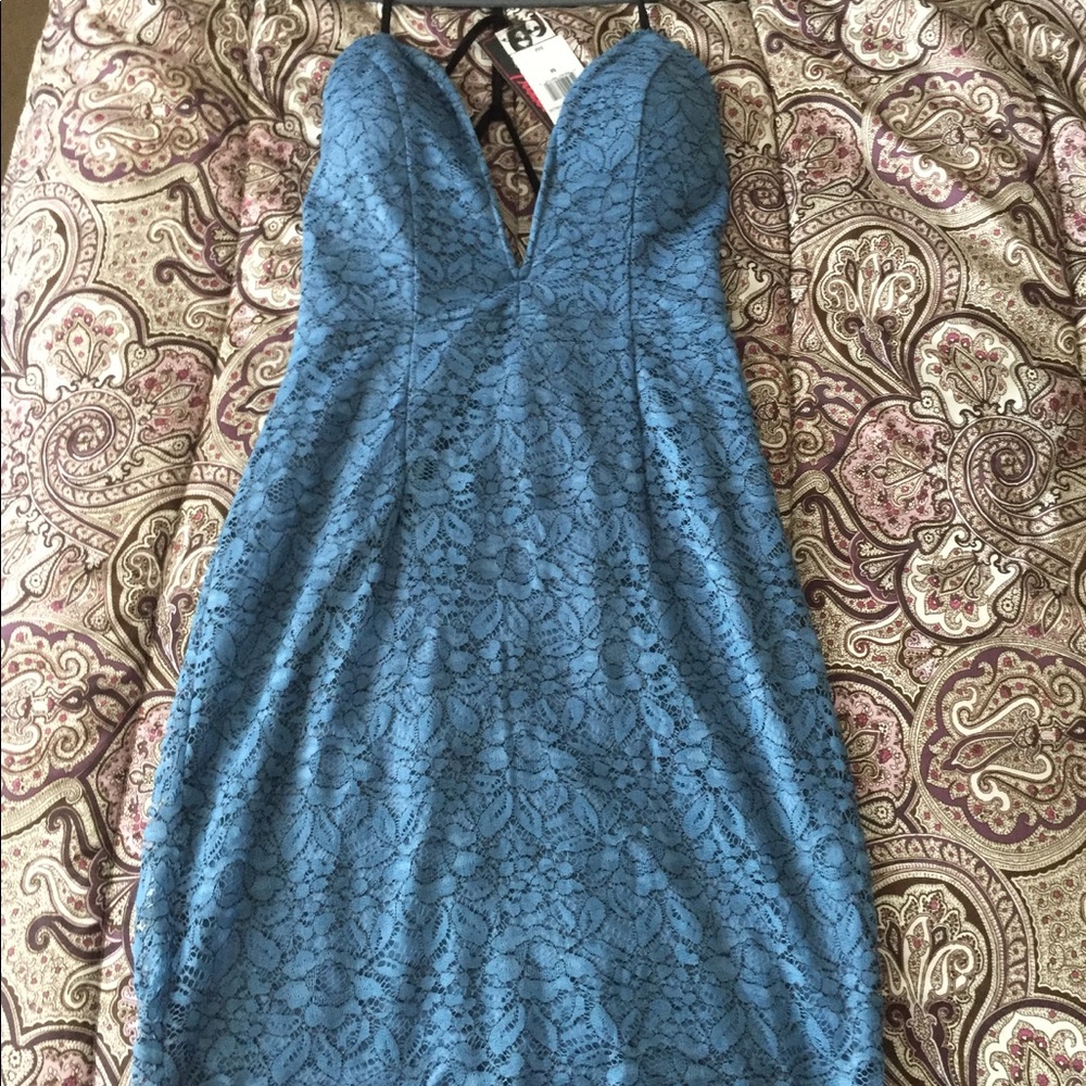Brand New blue backless dress and long V front